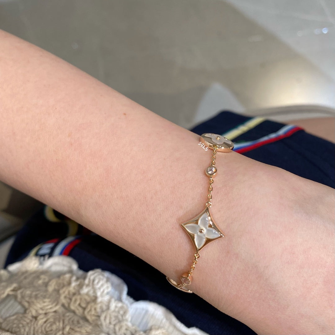 ¡®Veyra Jewelry¡¯STAR AND SUN 4 MOTIF WHITE MOP PINK GOLD BRACELET